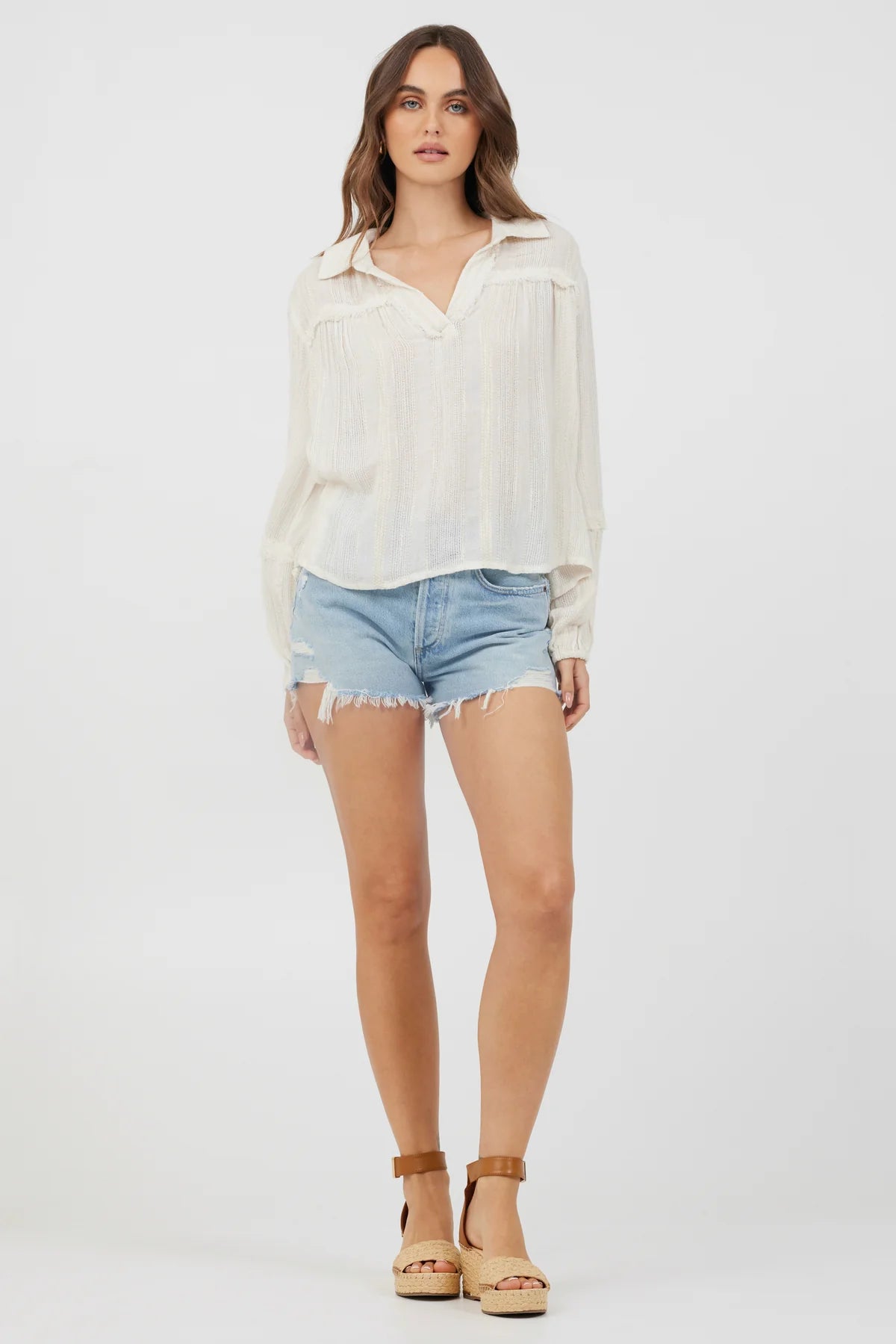 The Ivory Multi Texture Polo Blouse