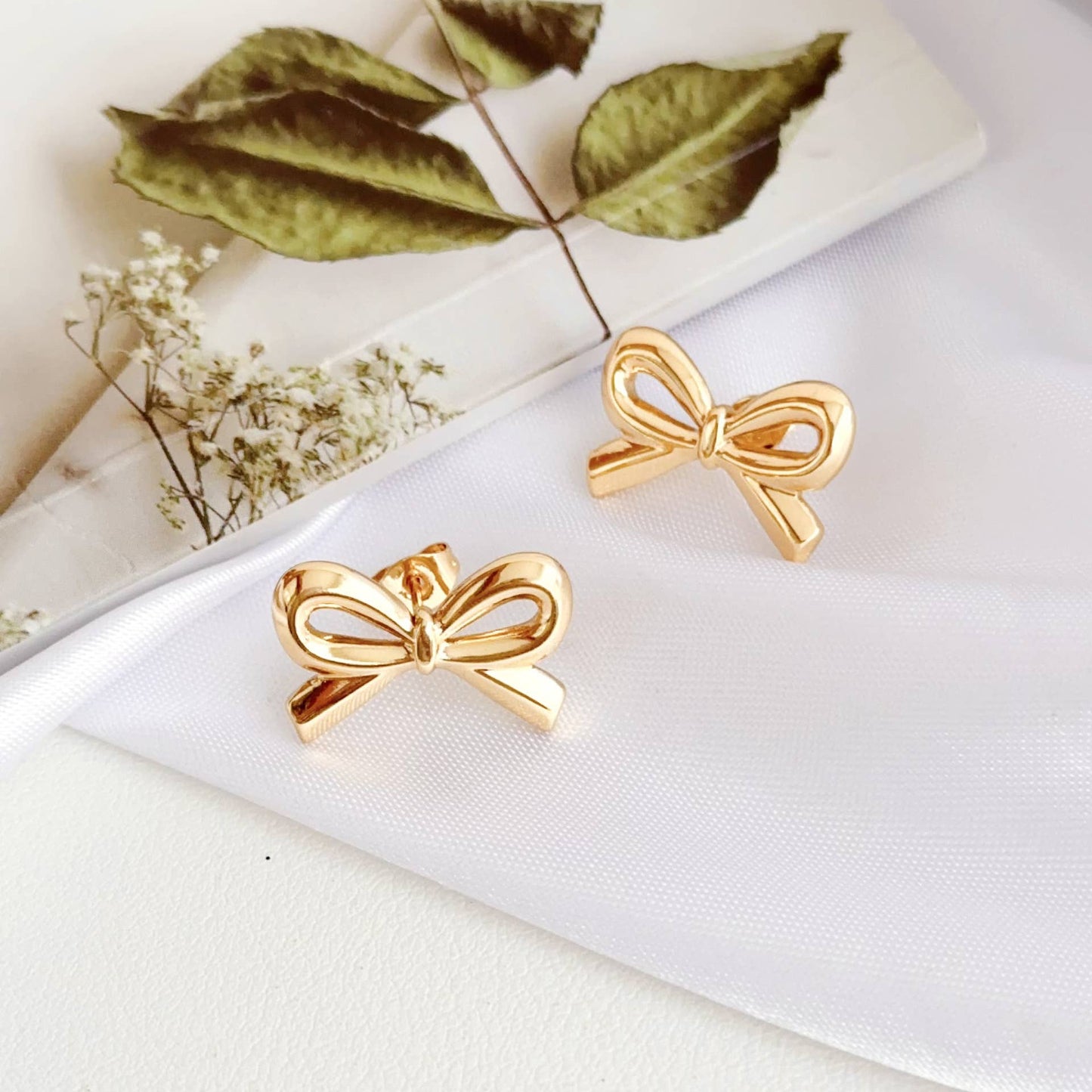 18K stainless steel tarnish free bow stud earring