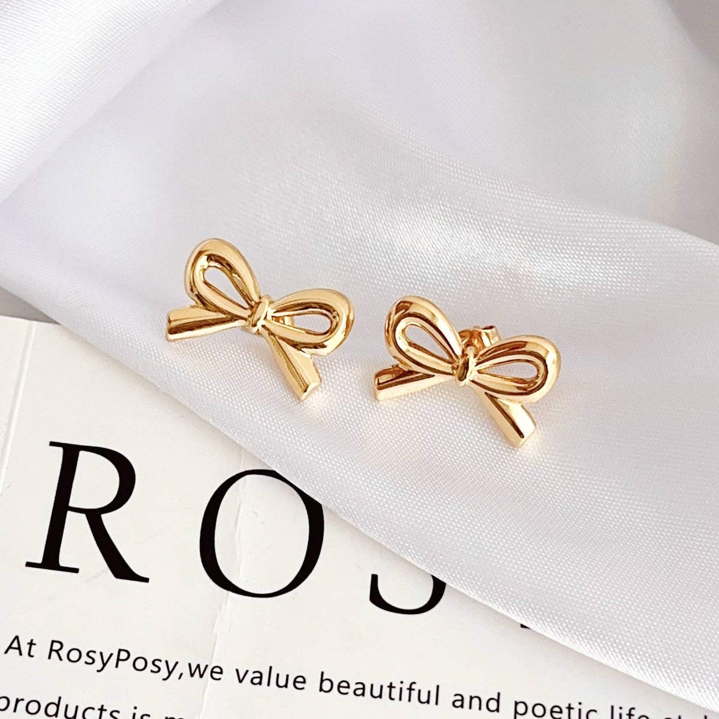 18K stainless steel tarnish free bow stud earring