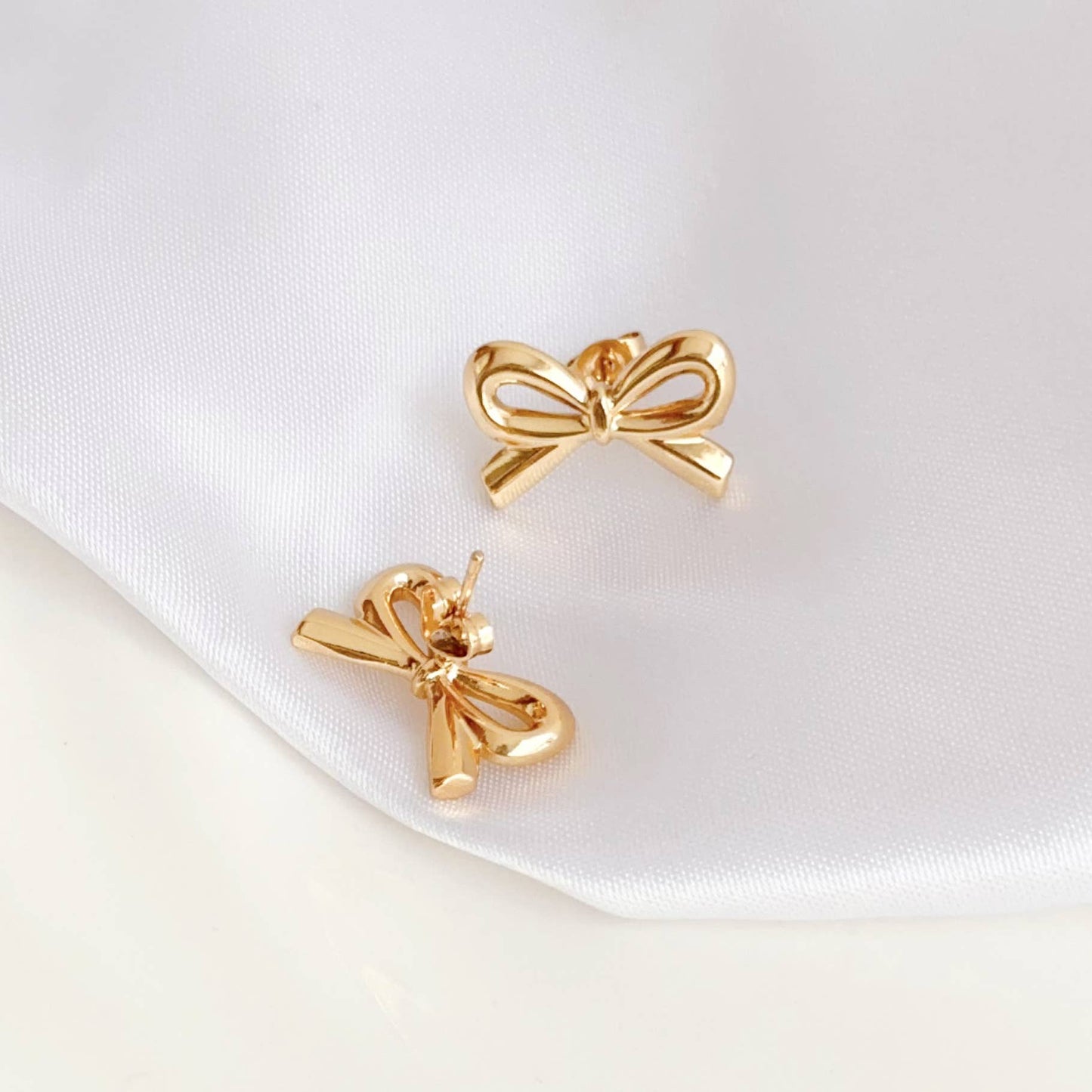 18K stainless steel tarnish free bow stud earring